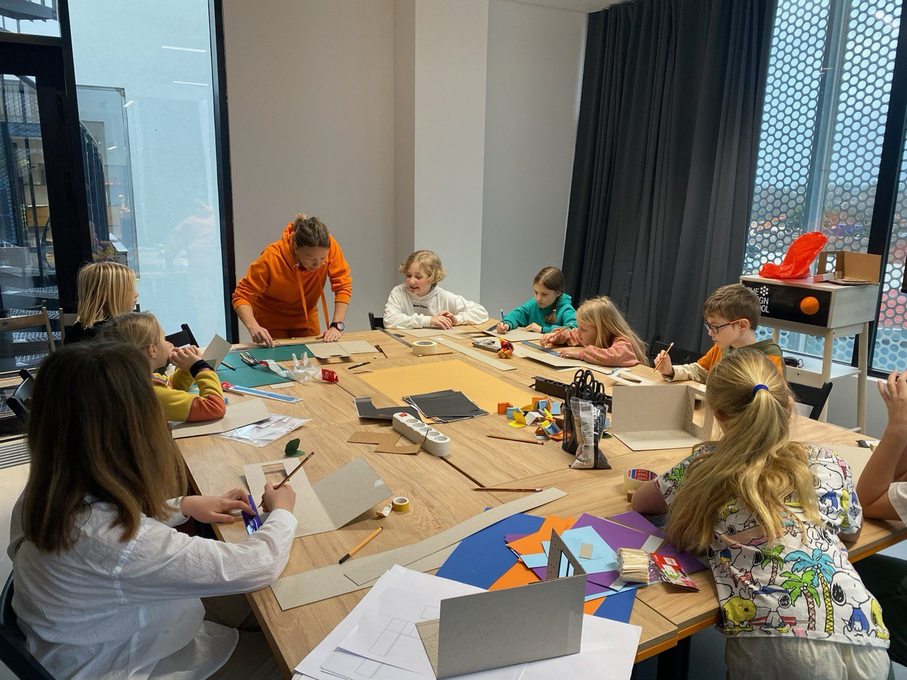 Children attending a design workshop at CheDesignSchool
